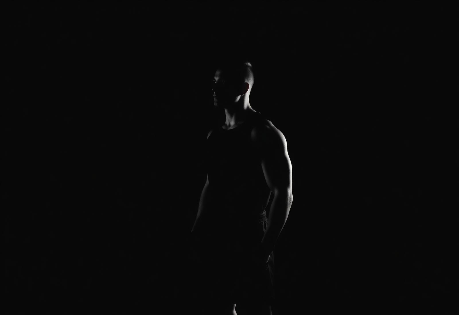 Athlete training in low light wearing Virtuous Athletix apparel